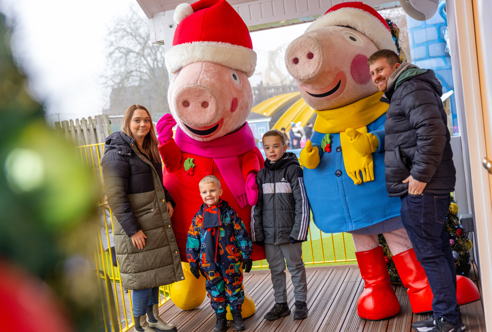 Peppa and George in their Santa hats